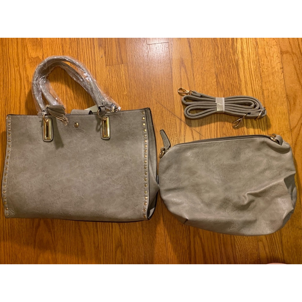 Gray Jen & Co. Bag in a bag can be carried by handle or shoulder strap